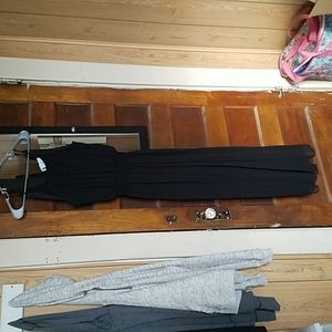 Black one piece romper.